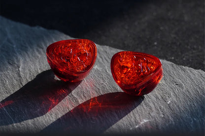 Auriculares IEM TANGZU Wan’er S.G II Red Lion Edition en color rojo, con diseño en-ear y especificaciones de graves.