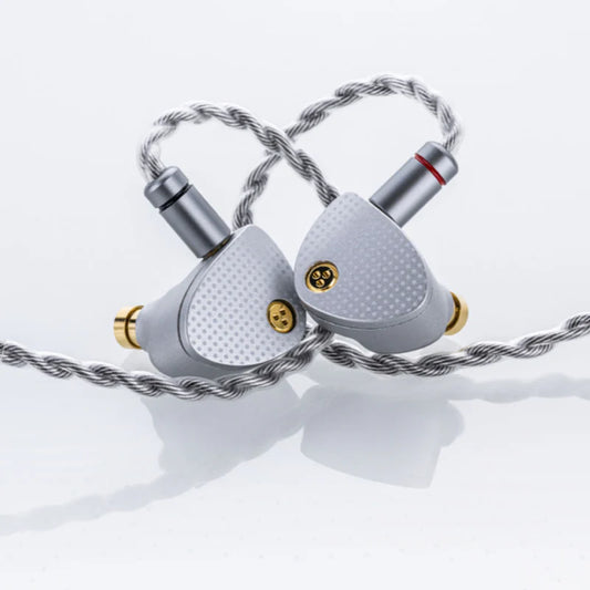 Audífonos IEM MOONDROP Aria 2 con diafragma TiN y filtros reemplazables, sonido dinámico y diseño en la imagen.